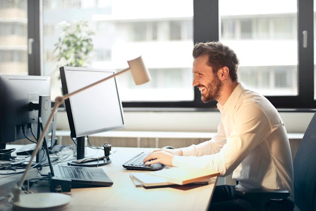 a%20property%20manager%20sitting%20at%20their%20desk%20looking%20at%20a%20computer a%20property%20manager%20sitting%20at%20their%20desk%20looking%20at%20a%20computer